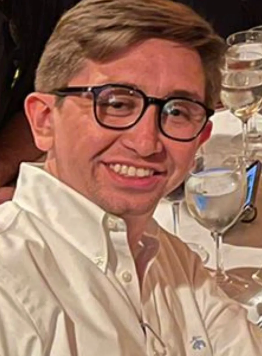 Close-up portrait of Lorenzo smiling
